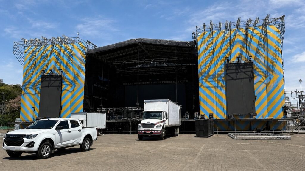 Large outdoor concert stage under construction in Costa Rica showing why professional two-way radio communication systems are essential for large-scale event operations.