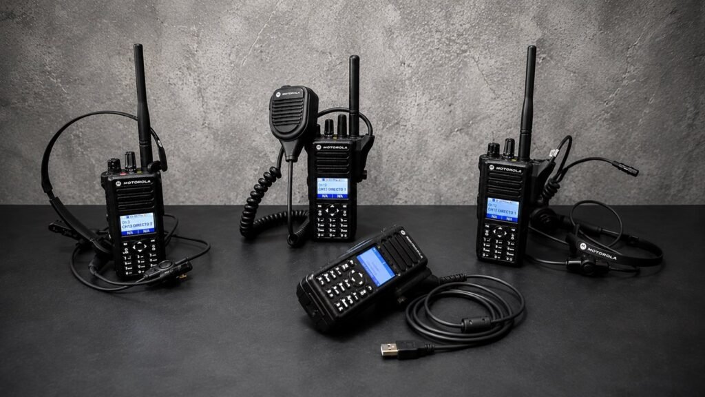 Professional Motorola radio accessories, programming cable, speaker microphone and surveillance headsets prepared for temporary mission-critical communication systems in Costa Rica.