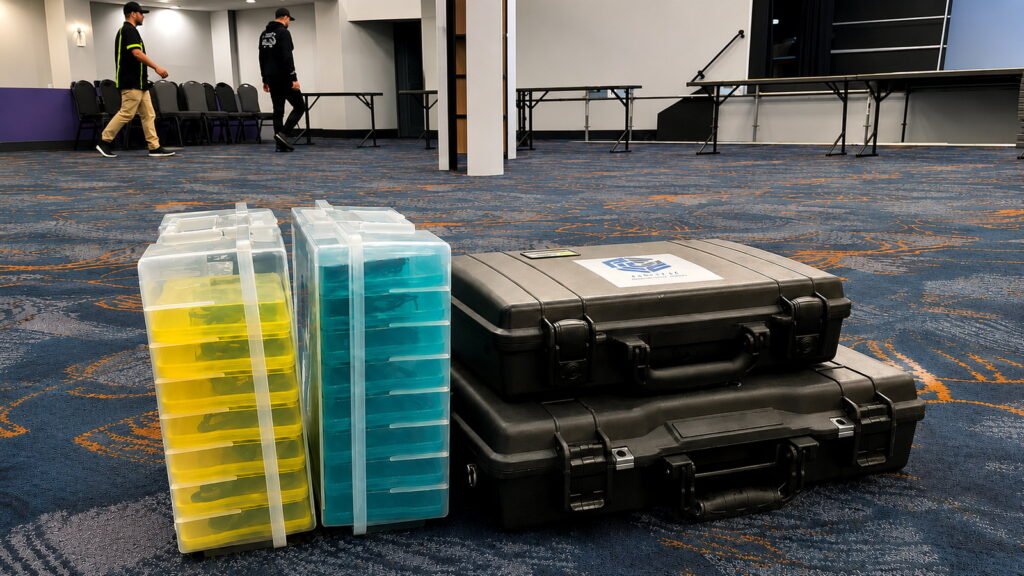 Portable communication equipment staged on site while event personnel prepare the venue for operations in Costa Rica.